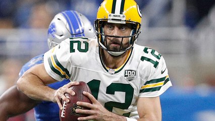 Rodgers finds an open hole on fourth-and-4 for 6 yards