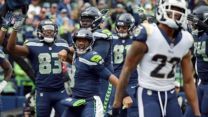 Wilson buys time, finds David Moore for TD