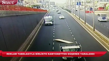 Reklam tabelasıyla birlikte kamyonetten düşerek yaralandı