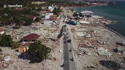 Stranded fishing boats and lone minarets: Last-ditch rescue efforts in Indonesia