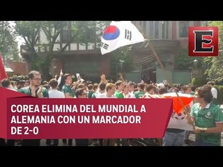 Aficionados del TRI celebrando la victoria de Corea ante Alemania