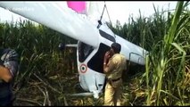 Indian farmers carry Air Force plane on shoulders after crash