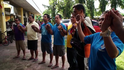 The statue saving a coral reef in the Philippines - BBC News