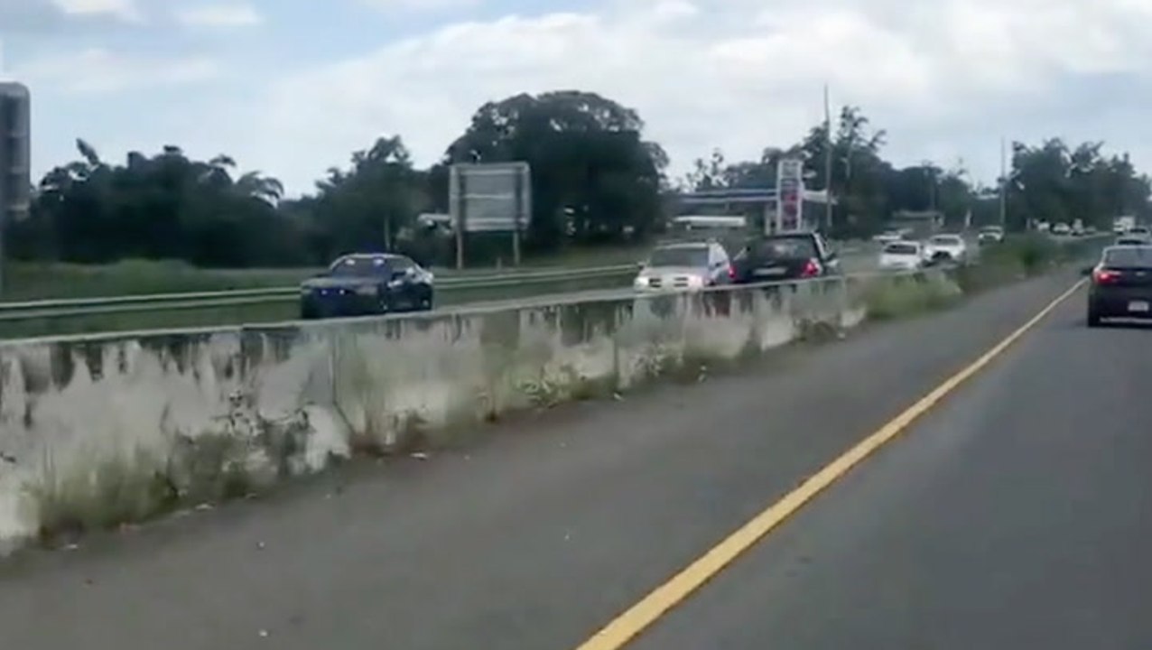 Cops Chase Wrong-Way Driver...In Reverse?!