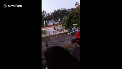 New footage of Indonesian tsunami emerges as rescue efforts are called off