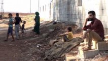 جدار تركي من أطول جدران العالم يفصل سوريا عن تركيا