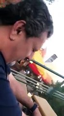 Dad is scared and screams whilst riding Smurfs rollercoaster ride