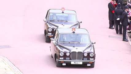 Adorable! Princess Charlotte waves as page girls arrive