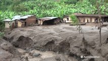 Dozens killed after massive landslide is triggered by torrential rains