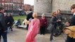 Pixie Geldof appears camera-shy as she departs royal wedding