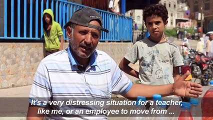Yemeni teacher sells petrol in the street to make ends meet