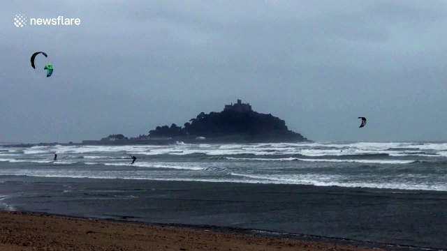 Ocean high! Kite surfers make most of gale-force winds in front of iconic St Michael's Mount
