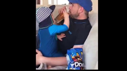 Son Feeding Dad Doritos