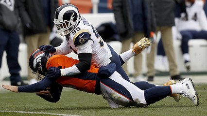 Donald sacks Keenum for loss of 14 yards on third down