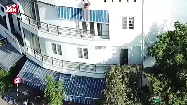 Nam thanh niên nghi ngáo đá cởi quần áo nhảy xuống từ tầng cao