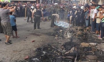 200 dolar ve 2 cep telefonu için yakılarak linç edildiler