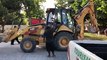 DRUNK TRACTOR DRIVER JUST MISSES CRASHING INTO POLICE VEHICLE - A drunk driver in a massive backhoe put the lives of many in danger on the southern road as he m