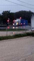 Stuck Semi-Truck Gets Direct Hit from Train