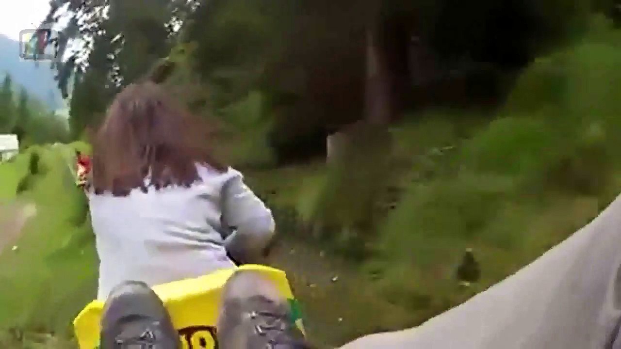 Angry Guy on Alpine Coaster Crashes into Woman