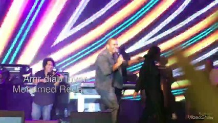 عمرو دياب يتجرأ للمرة الأولى ويشعل حفله بتصرف مفاجئ مع دينا الشربيني