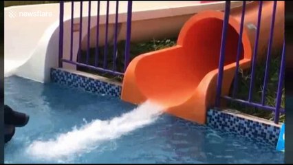 Tourist smashes into lifeguard as she exits water slide