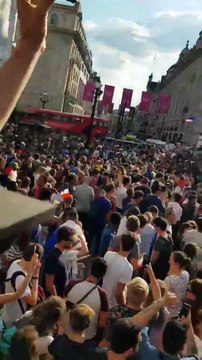 French fans celebrating at Piccadilly Circus