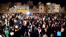 Train plows into festival crowd in India, killing dozens