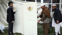 Afghan voters head to the polls amid security threats