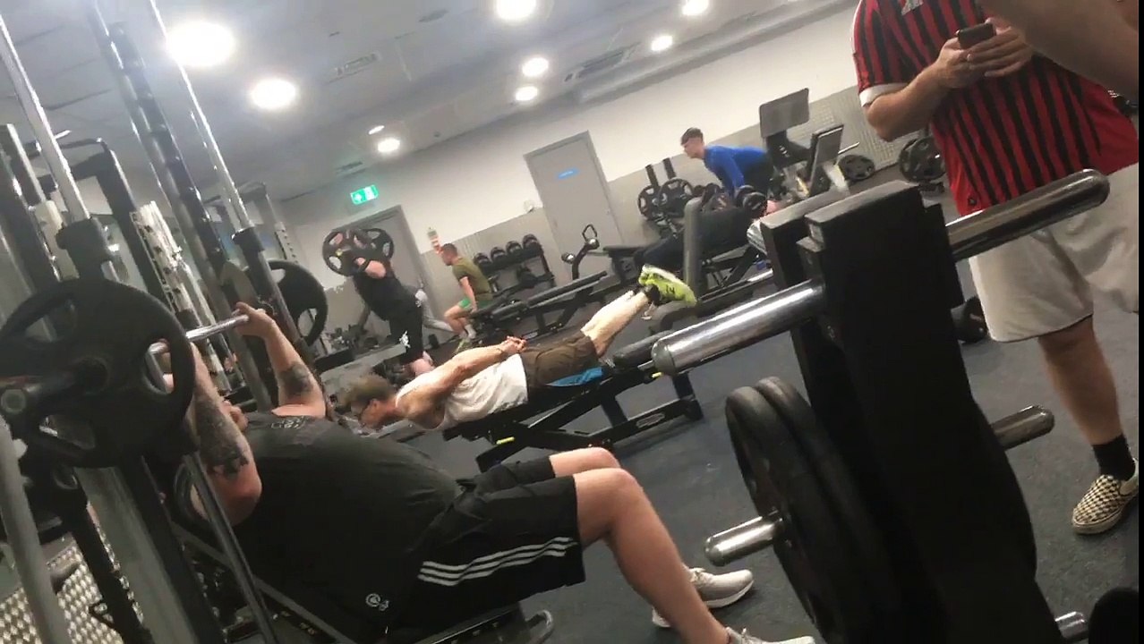 does weird workout with his hands behind his back