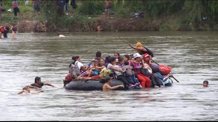Migrant caravan swims and rafts its way into Mexico