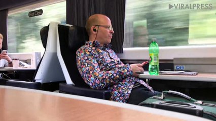 Passenger In Headphones Singing On Train