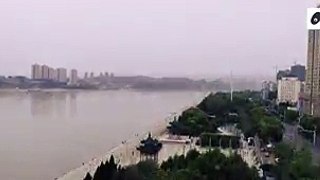 A bird's-eye view of Yichang, which lies on the northern bank of the Yangtze River. Benefiting from the Three Gorges Dam Project, it has become the largest hydr