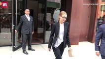 Gigi Hadid sexy and sophisticated in black blazer and glasses