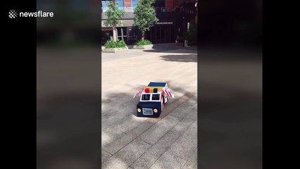 Little boy 'transforms' himself  into police car