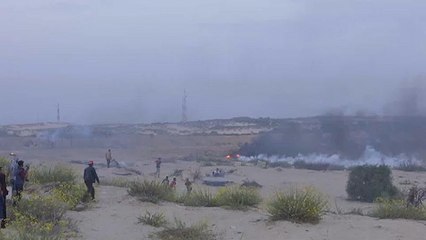 Télécharger la video: Confrontos israelo-palestinianos na praia de Gaza