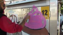 Italian street artist covers up swastika graffiti with giant cupcakes