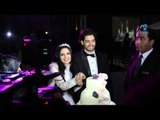 ياسمين جيلاني و عمر خورشيد يقطعان تورتة الزفاف