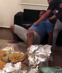 Friends joking with friend during lunch.. Afraid of cobra