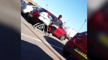 Hilarious moment as couple try to unlock car while their vehicle sits two spaces away