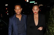 Chrissy Teigen says John Legend is an 'aggressive cuddler'