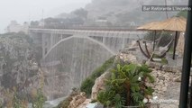 Bridge turns into spectacular waterfall from heavy rainfall