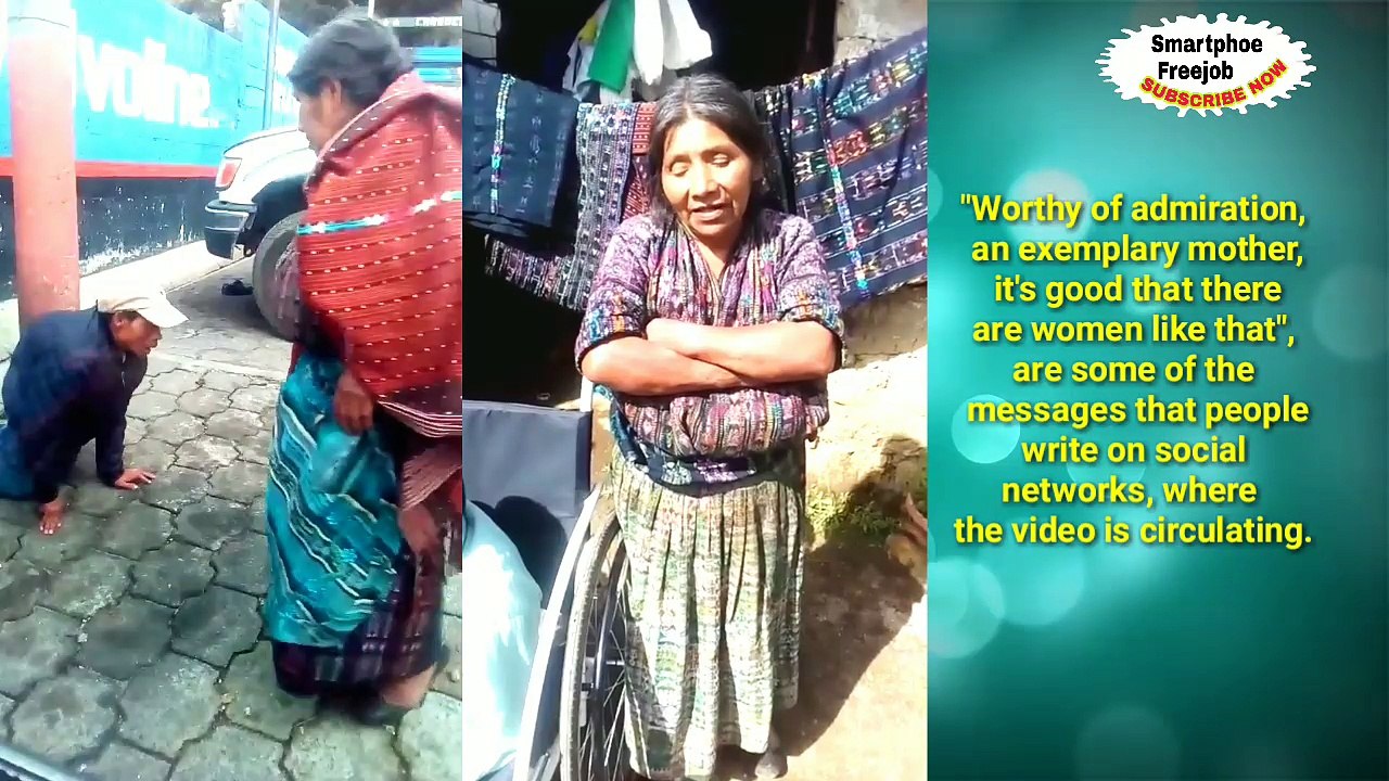 A woman carrying her disable son. So proud of her. MOTHER'S love sad