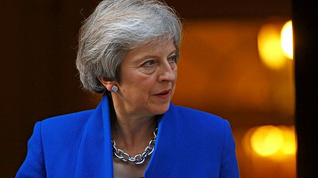 Theresa May halts Conservative Party rebellion on Brexit