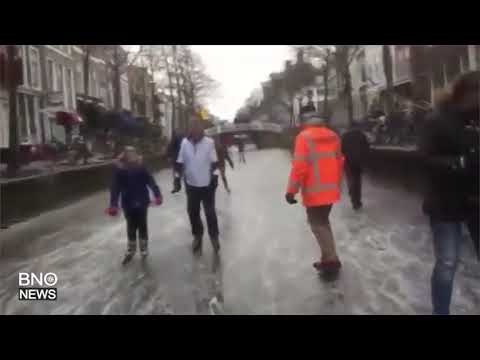 Ice skaters grace over frozen canals during Netherlands cold snap