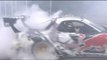 Mad Mike Whiddet drifts his RX7 in the paddock. One handed.