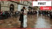 Newlywed couple enjoy first dance in Scotland's busiest shopping street | SWNS TV