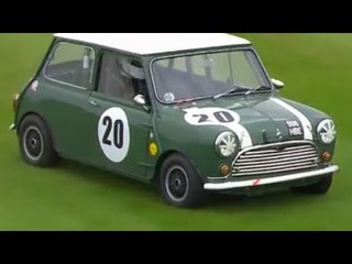 Amazing moment Mini Cooper takes detour on grass