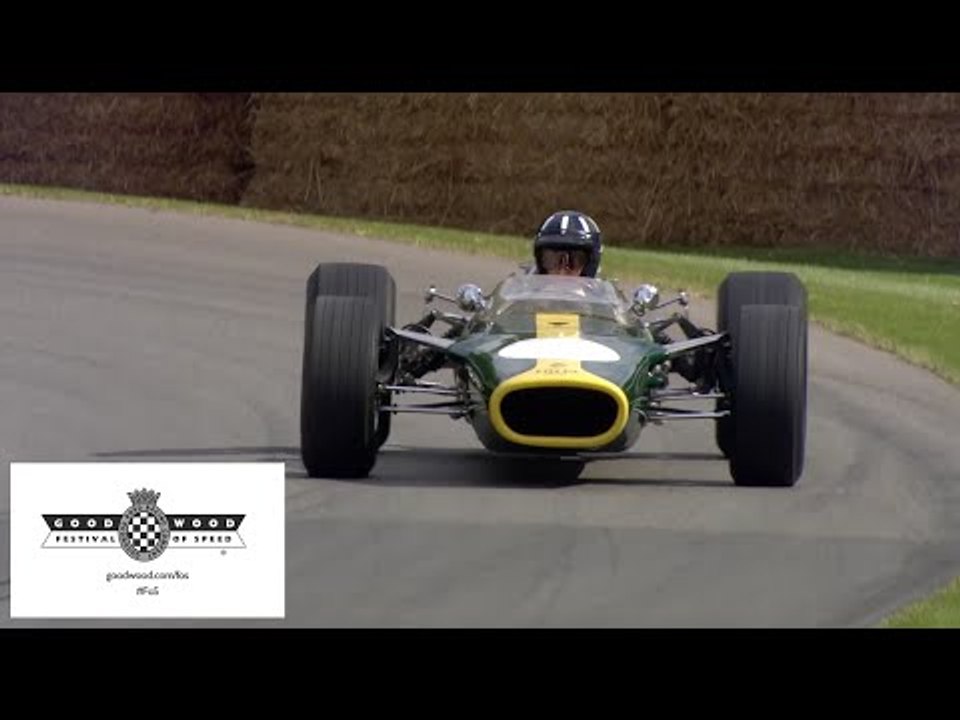 F1 Champion Damon Hill drives his father's Lotus at Goodwood