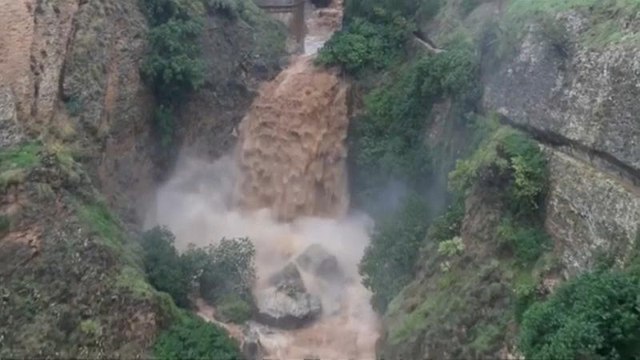 River in Spain's Malaga province swells after heavy rains