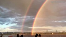 Beautiful Double Rainbow Over Naga Brass Statue